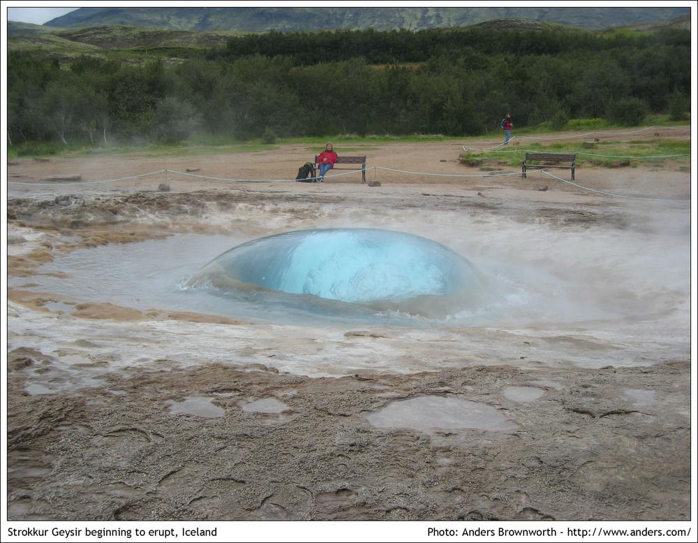 Strokkur geysir beginning to erupt · Iceland